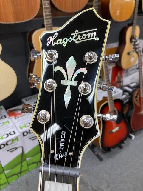 Hagstrom Super Viking Semi-Hollow Guitar in Wild Cherry Transparent Gloss Articulate. Expressive. Aggressive.