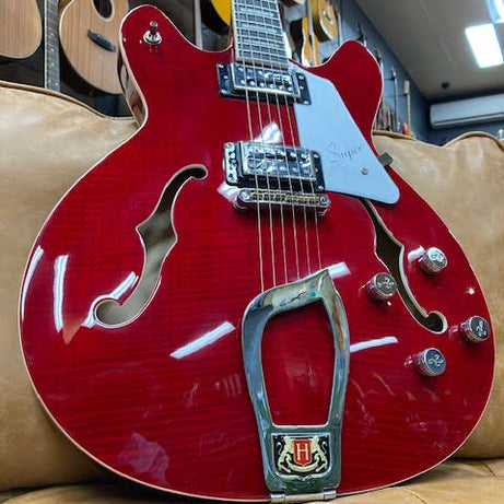 Hagstrom Super Viking Semi-Hollow Guitar in Wild Cherry Transparent Gloss Articulate. Expressive. Aggressive.