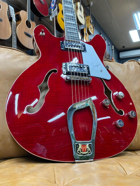 Hagstrom Super Viking Semi-Hollow Guitar in Wild Cherry Transparent Gloss Articulate. Expressive. Aggressive.