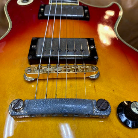 Greco Face of Guitar on the couch at Music at Noosa Australia 