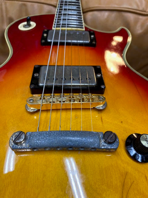 Greco Face of Guitar on the couch at Music at Noosa Australia 