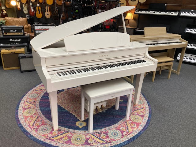 Yamaha CLP-565GP White digital baby grand piano (preowned) w/ stool